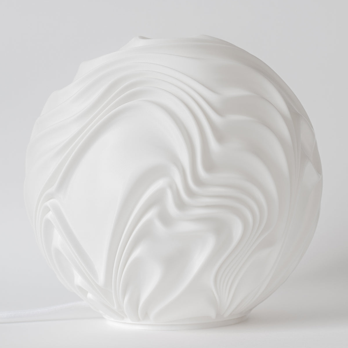 Onde : la grande lampe inspirée des remous d'une cascade
